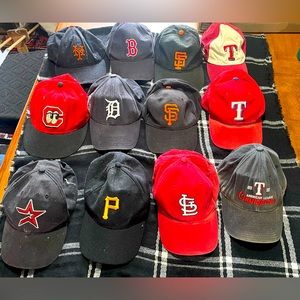 Assortment of vintage/modern MLB caps.